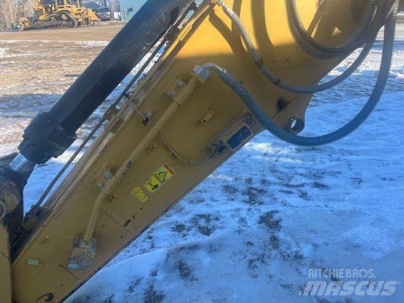 CAT 323FL Гусеничные экскаваторы