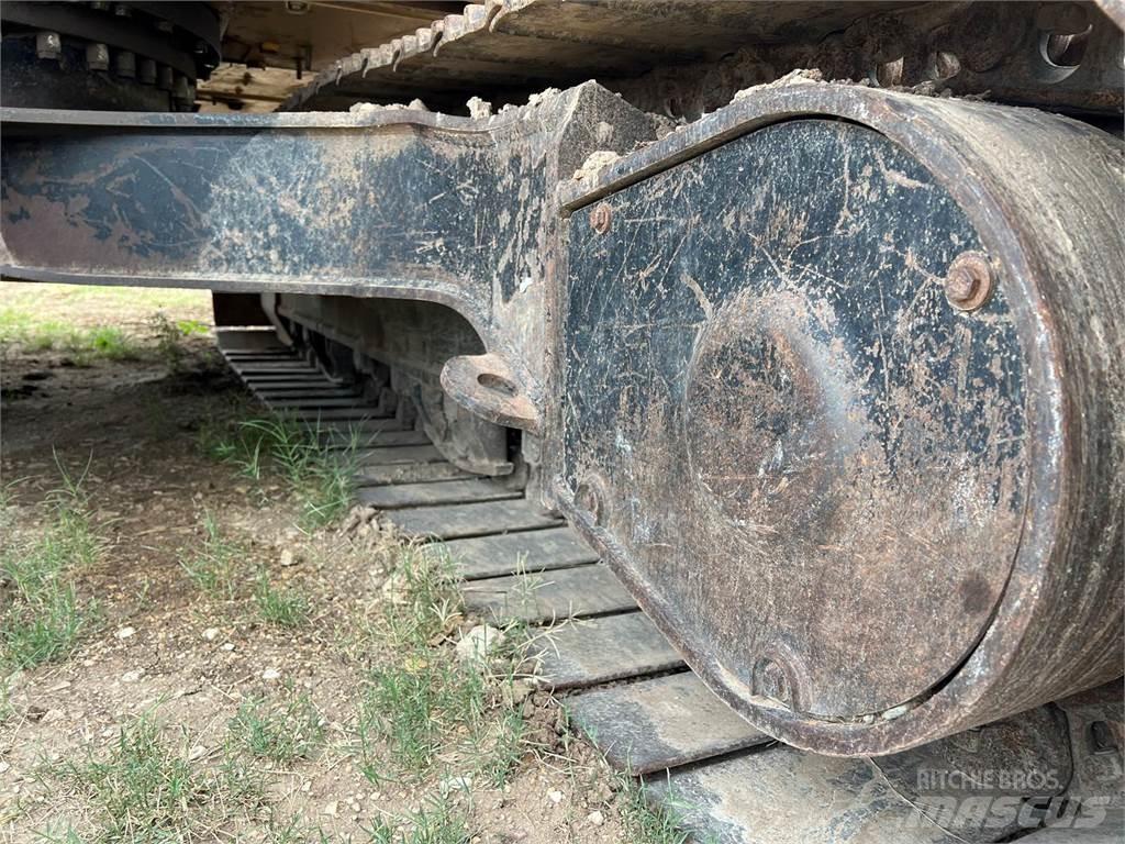 CAT 323FL Гусеничные экскаваторы