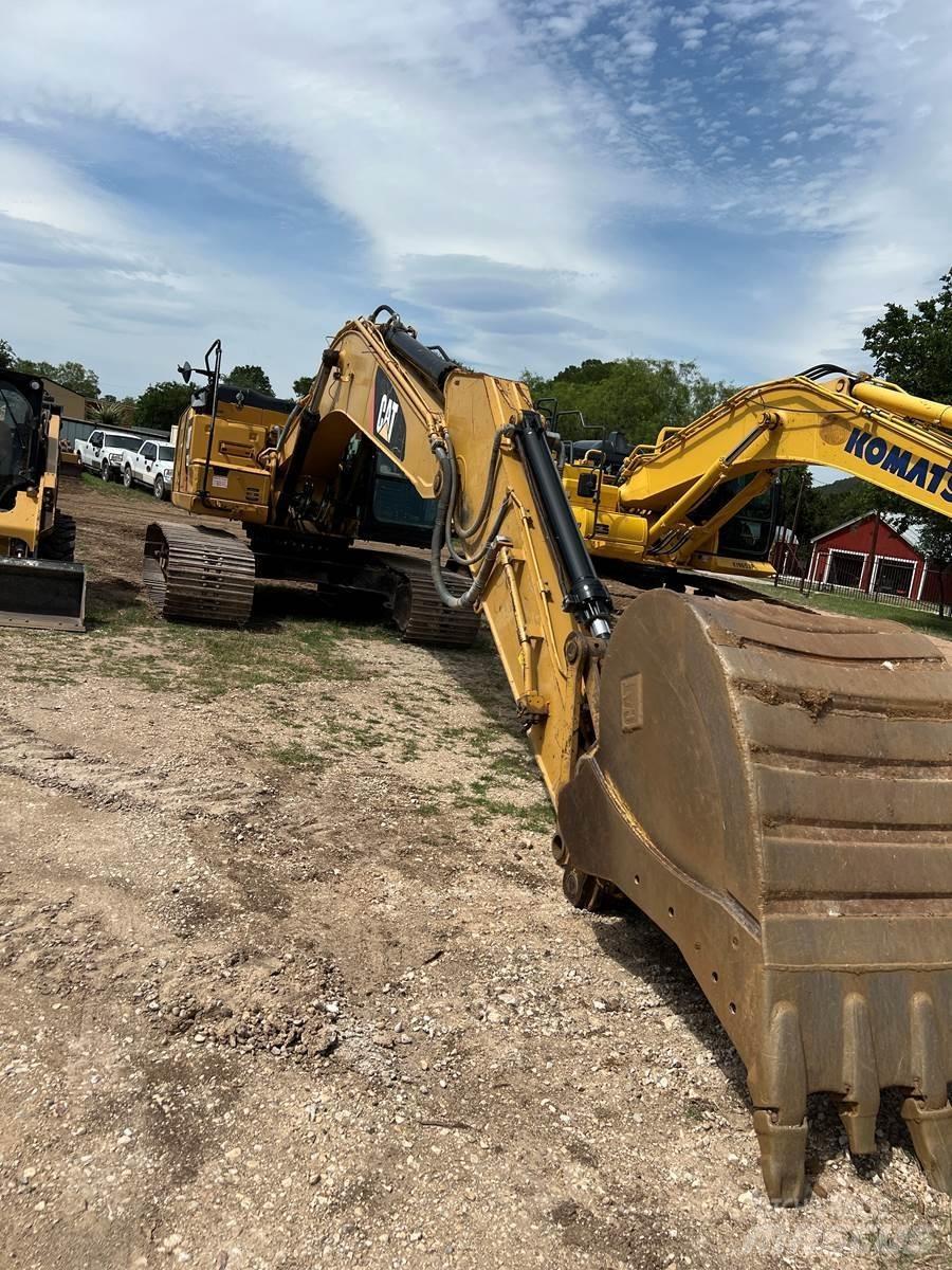 CAT 323FL Гусеничные экскаваторы