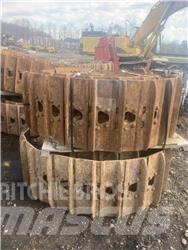 CAT 325 Гусеницы и цепи