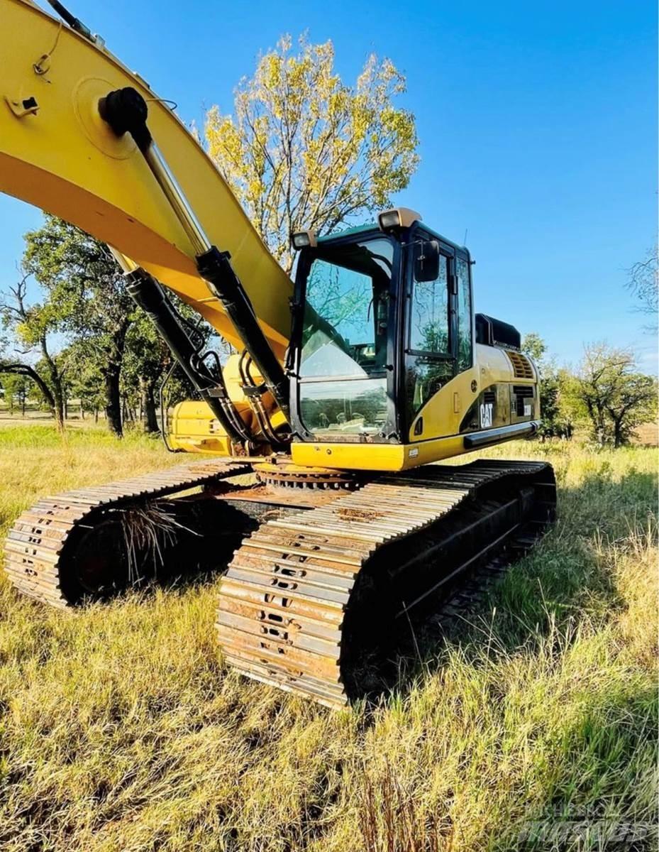 CAT 330DL Гусеничные экскаваторы