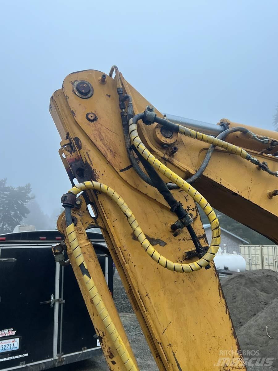 CAT 416 Экскаваторы-погрузчики