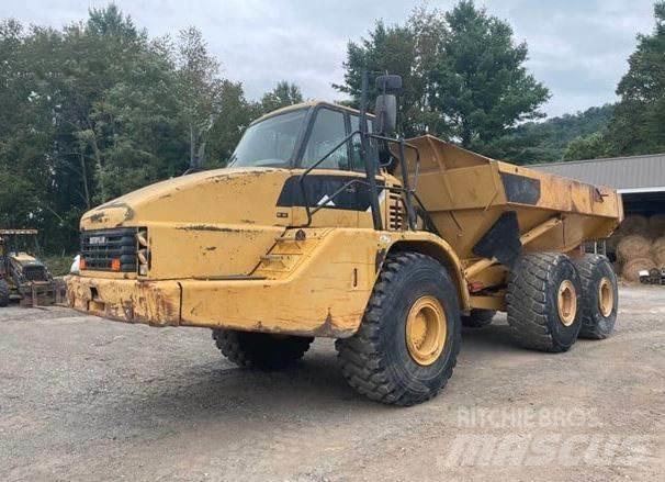 CAT 740 Шарнирно-сочленённые самосвалы