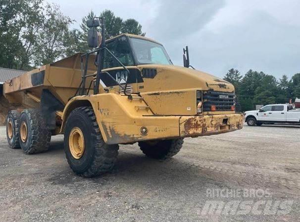 CAT 740 Шарнирно-сочленённые самосвалы