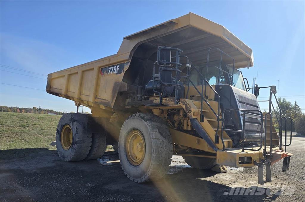 CAT 775F Шарнирно-сочленённые самосвалы