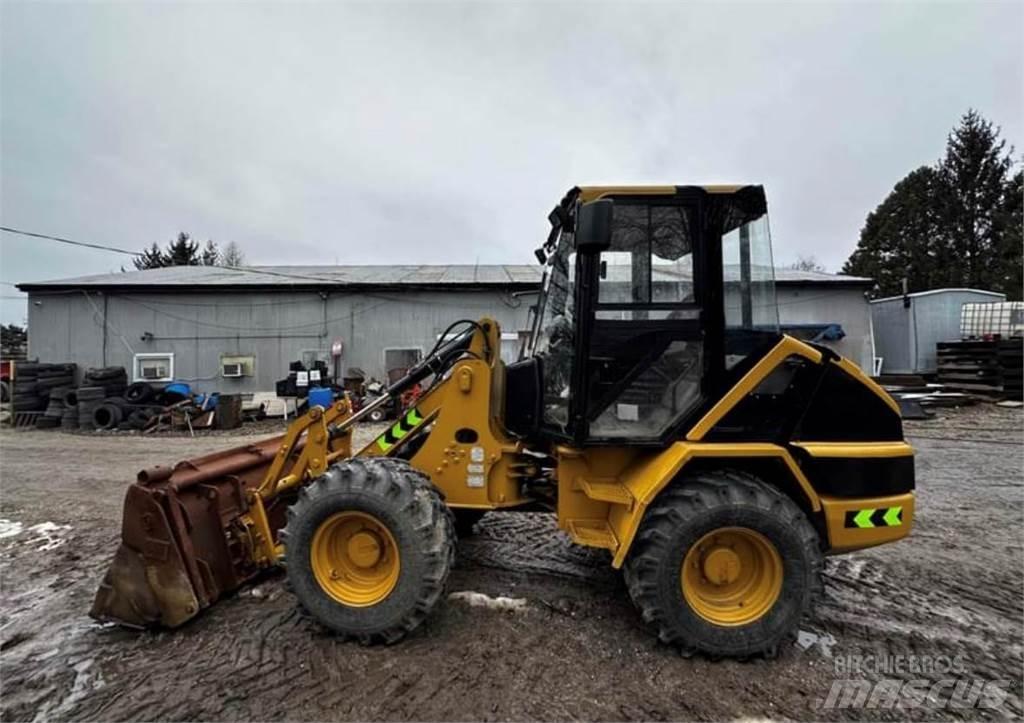 CAT 906 Фронтальные погрузчики