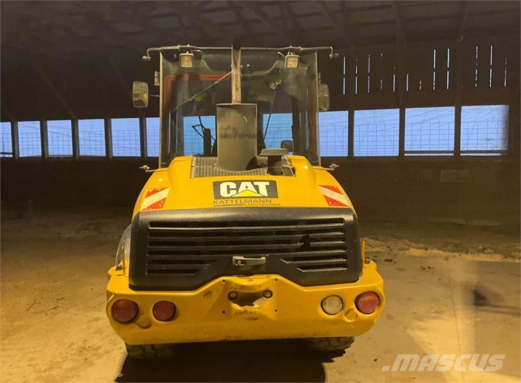 CAT 906H Фронтальные погрузчики