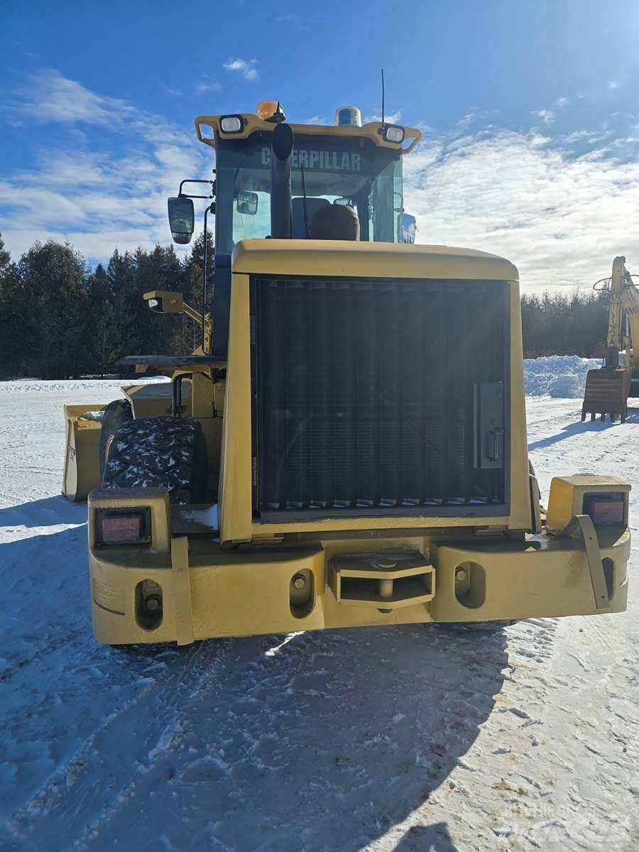 CAT 938H Фронтальные погрузчики