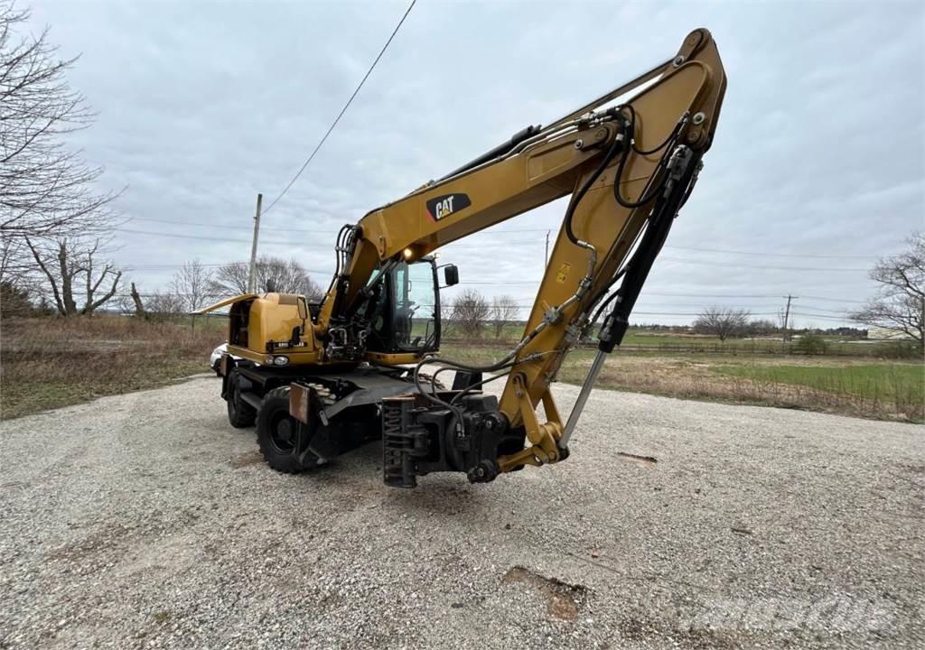 CAT M313D Колёсные экскаваторы