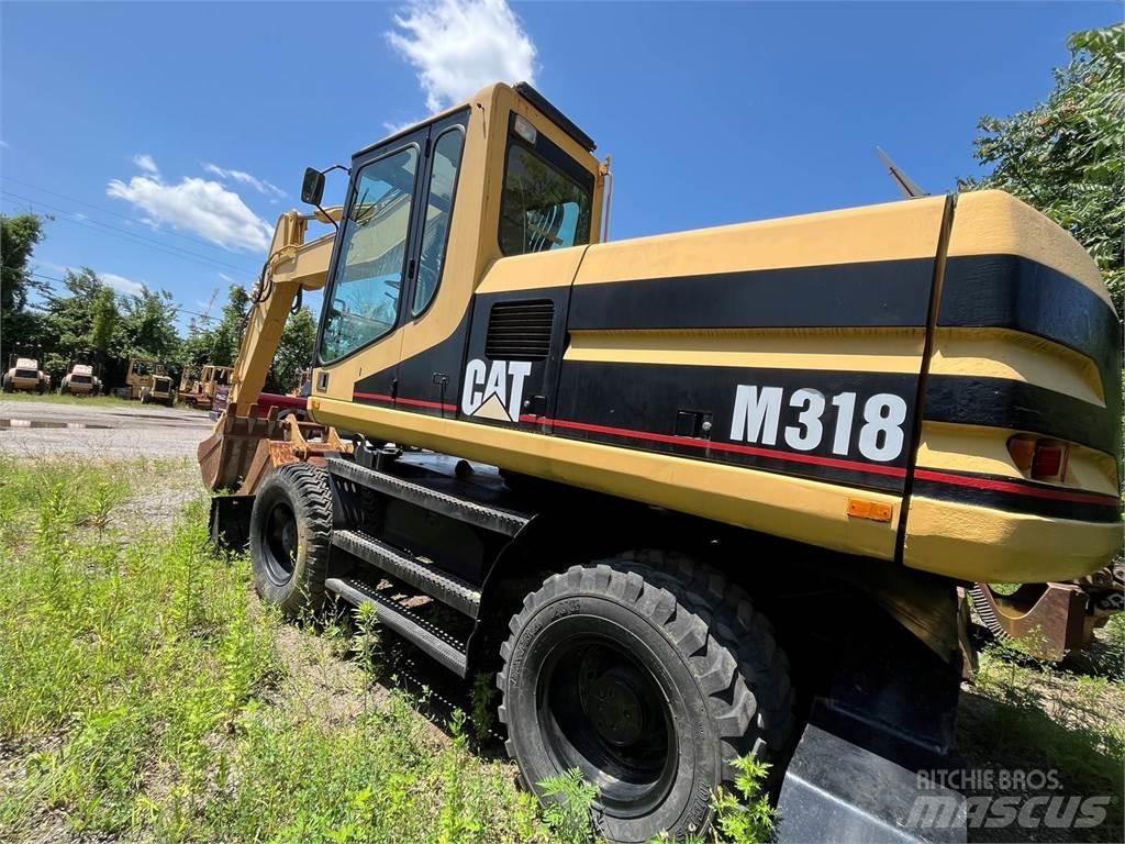 CAT M318 Колёсные экскаваторы