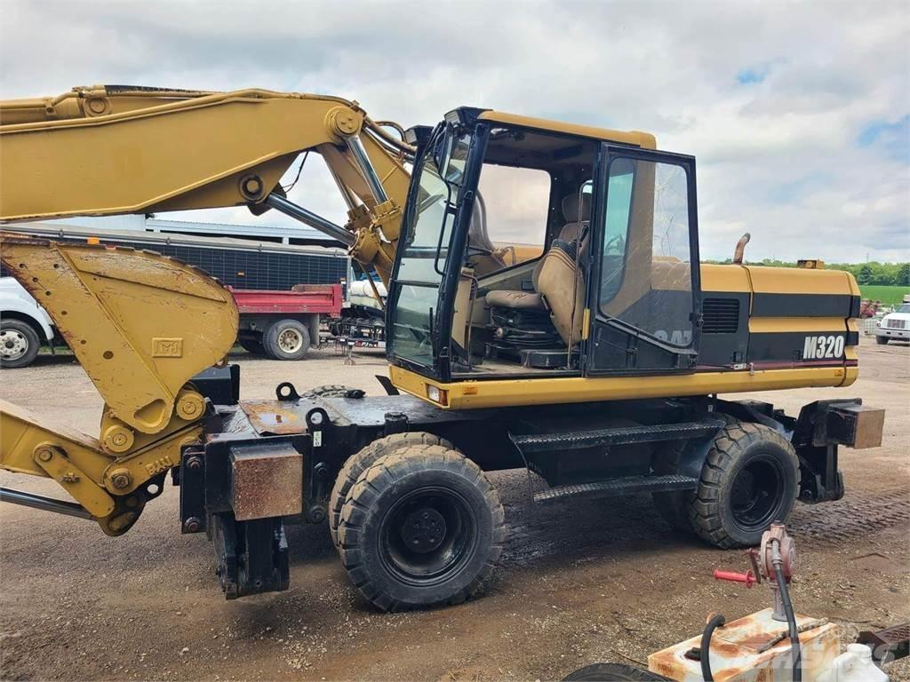 CAT M320 Колёсные экскаваторы