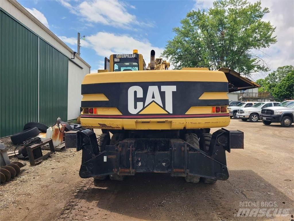 CAT M320 Колёсные экскаваторы