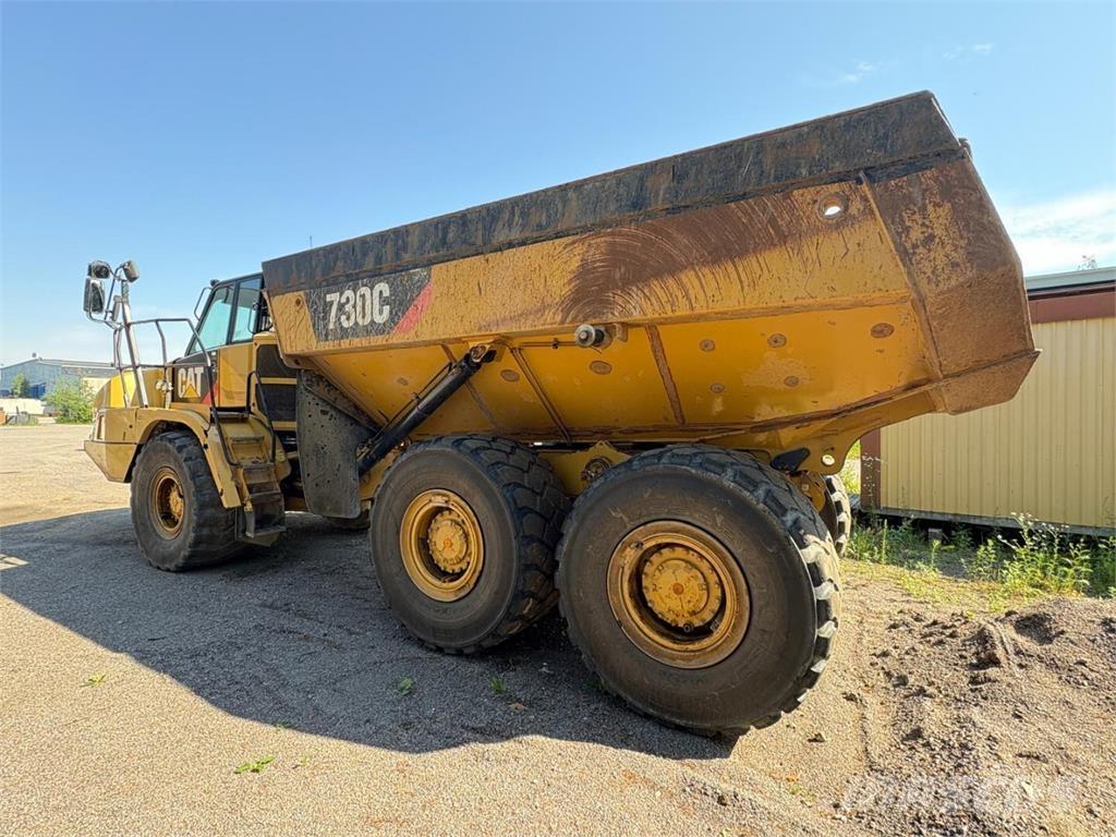CAT 730 C Шарнирно-сочленённые самосвалы