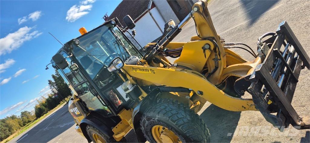 CAT 906M Фронтальные погрузчики