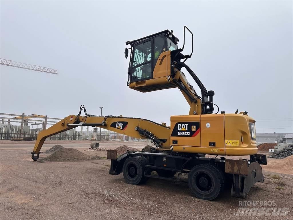 CAT MH3022 Колёсные экскаваторы