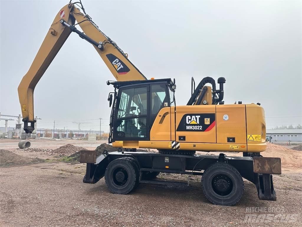 CAT MH3022 Колёсные экскаваторы