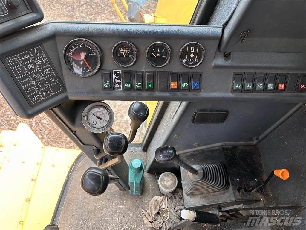 New Holland TC56 Зерноуборочные комбайны