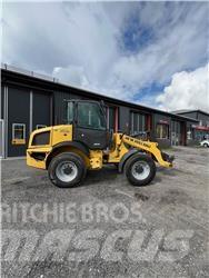New Holland W70C Фронтальные погрузчики