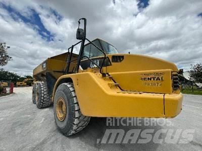 CAT 740 Шарнирно-сочленённые самосвалы