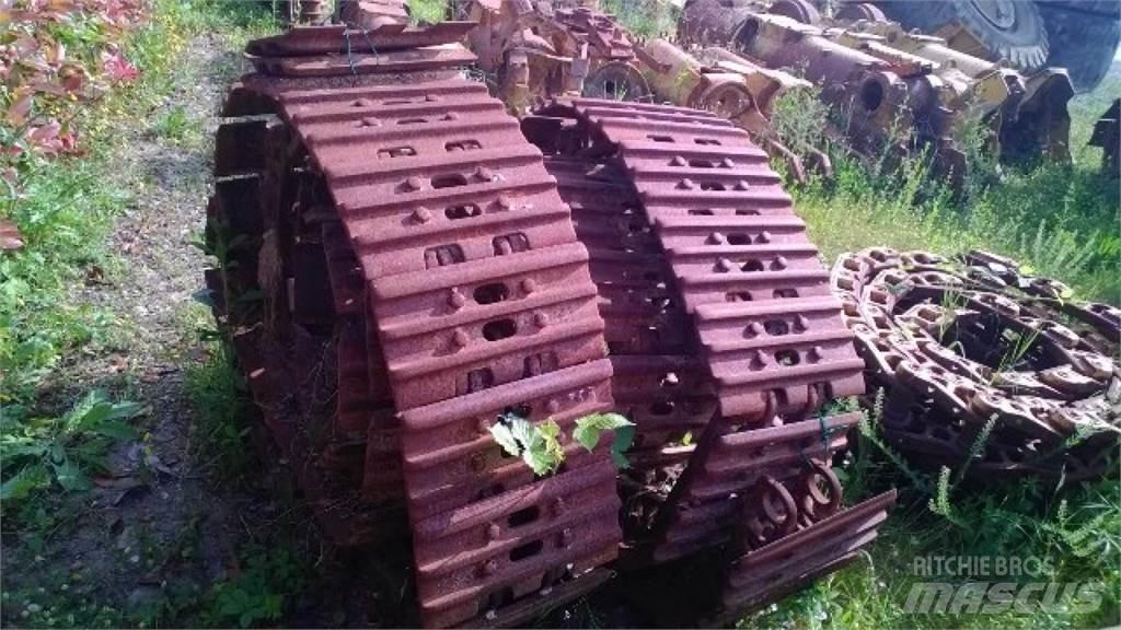 CAT 953 Гусеницы и цепи