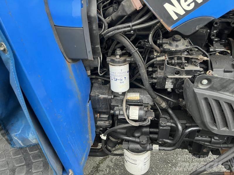 New Holland TN70A Трактора