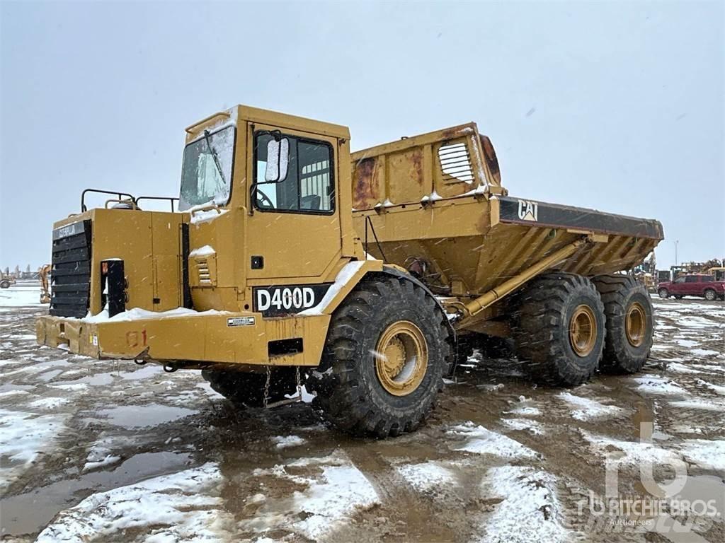 CAT D400D Шарнирно-сочленённые самосвалы
