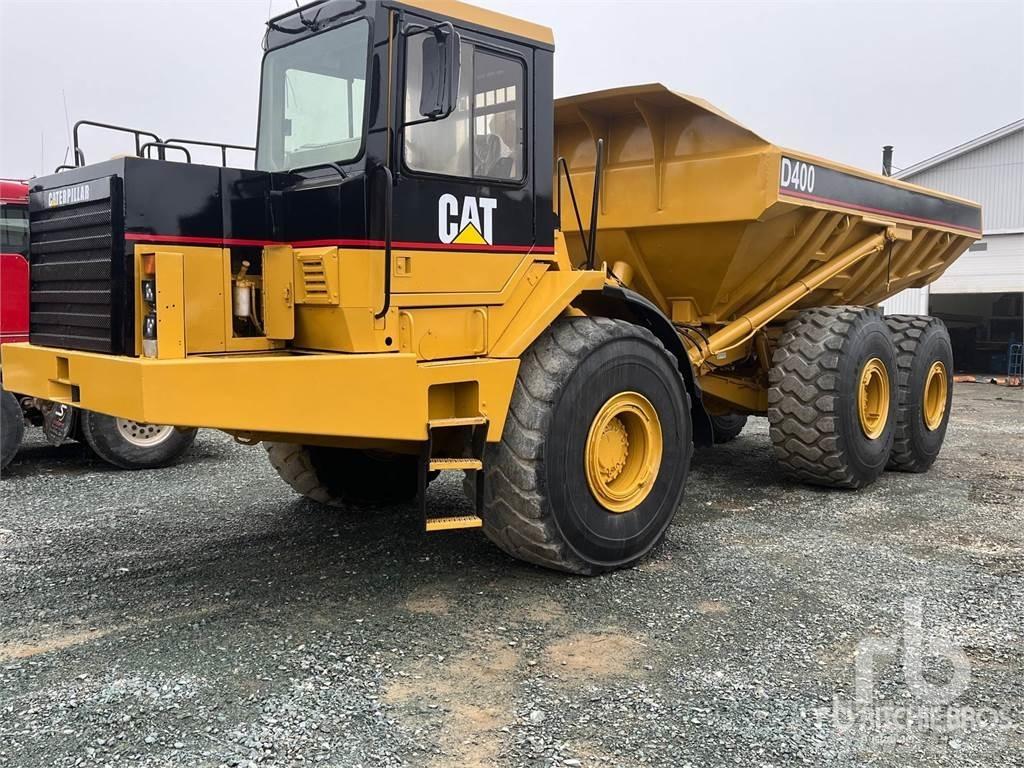 CAT D400E Шарнирно-сочленённые самосвалы
