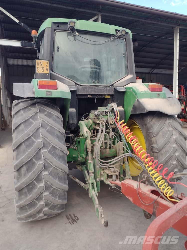 John Deere 6610 Трактора