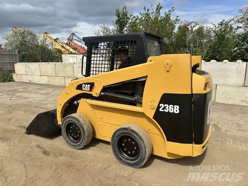 CAT 236B Строительная техника - Другие
