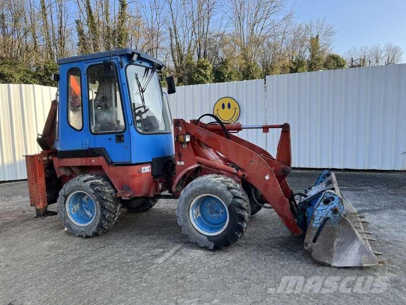 Kubota R520 Экскаваторы-погрузчики