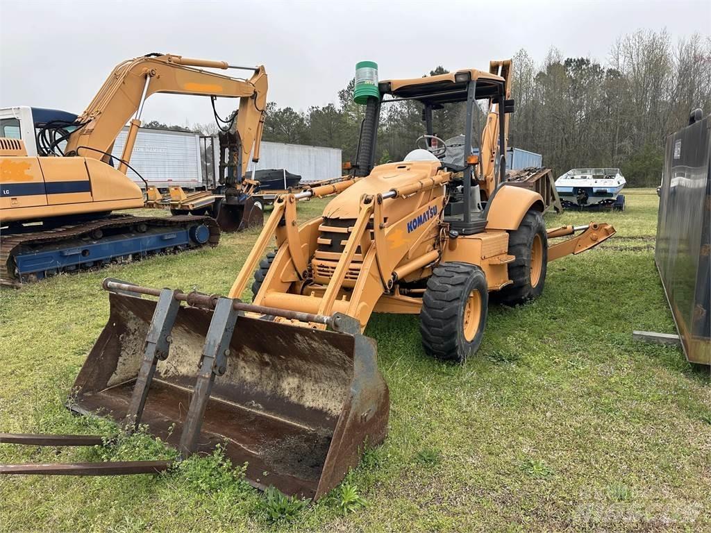 Komatsu WB140 Экскаваторы-погрузчики