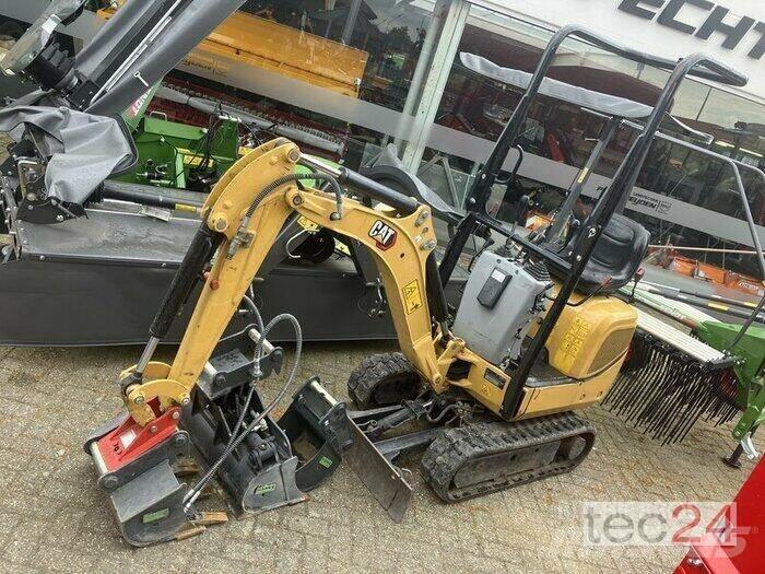 CAT 300.09D Колёсные экскаваторы