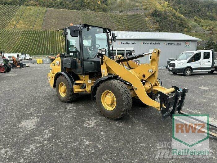 CAT 907 Фронтальные погрузчики