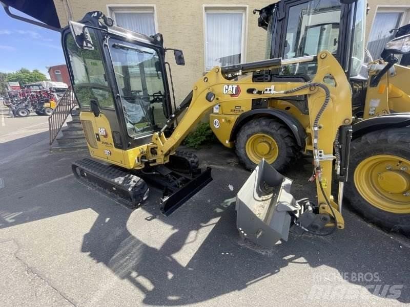CAT 302CR-05A Мини-экскаваторы