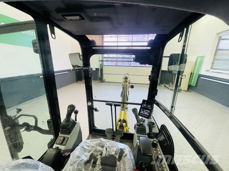 CAT 302CR-05A Колёсные экскаваторы