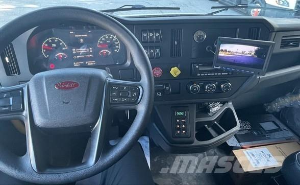Peterbilt 548 Грузовики-Самосвалы