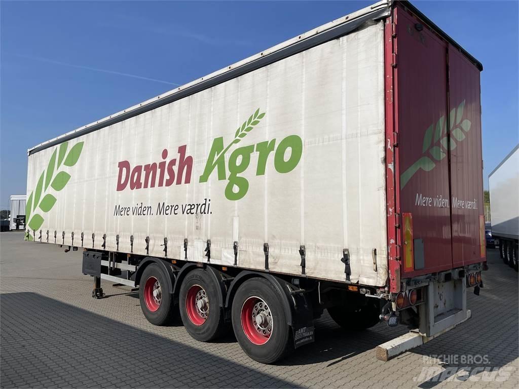 AMT Truckbeslag Тентованные полуприцепы