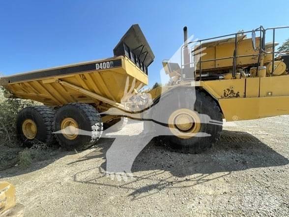 CAT D400D Шарнирно-сочленённые самосвалы